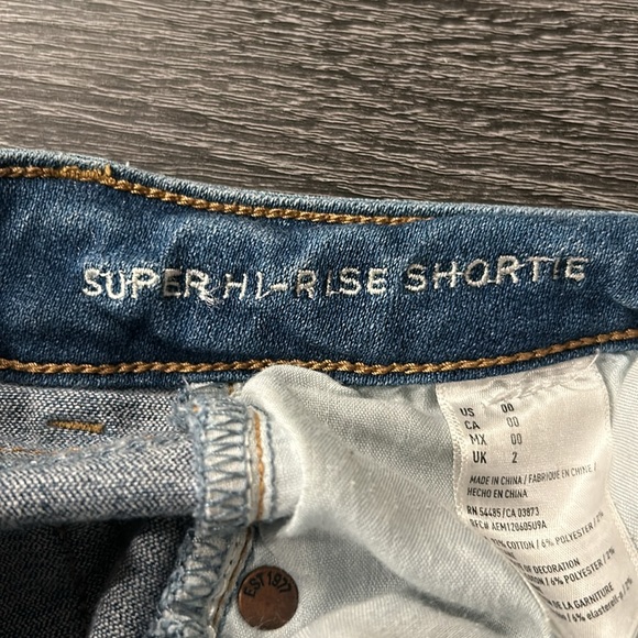 American Eagle super hi rise distressed rolled jean shorts - Picture 6 of 11